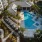 Resort-Style Pool w/ Sun Shelf + Private Cabanas
